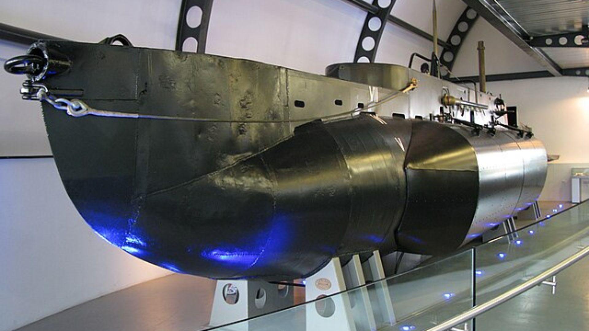 A historical X-craft midget submarine displayed in a museum
